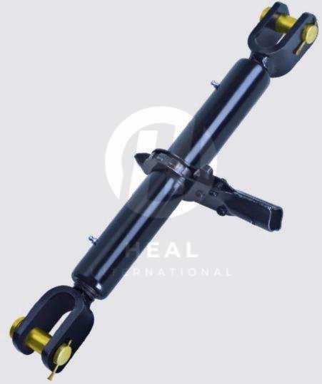 A heavy-duty adjustable tractor top link assembly with forged end joints and a black threaded body from HEAL INTERNATIONAL.